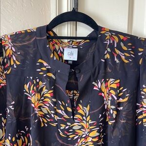 CAbi Black Top with Colorful Floral Design